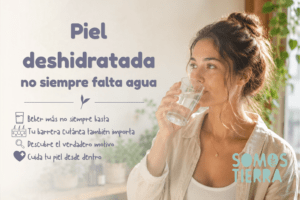 Mujer bebiendo agua con piel seca mientras descubre por qué la piel seca aunque bebas agua puede deberse a una barrera cutánea debilitada.